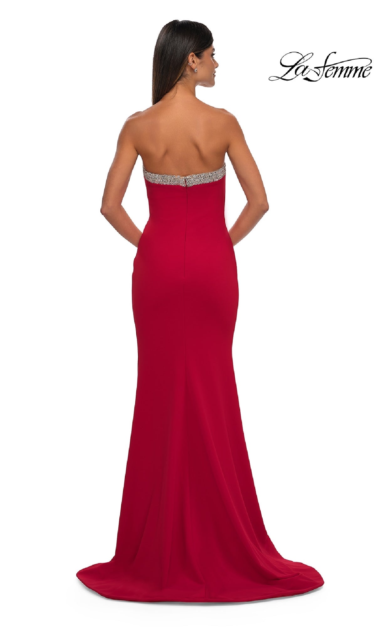 A woman faces away in the La Femme 32891 Bead-Trimmed Long Prom Dress, a strapless red gown with a fitted bodice and jeweled trim. The La Femme logo is displayed in the upper right, highlighting this elegant formal dress.